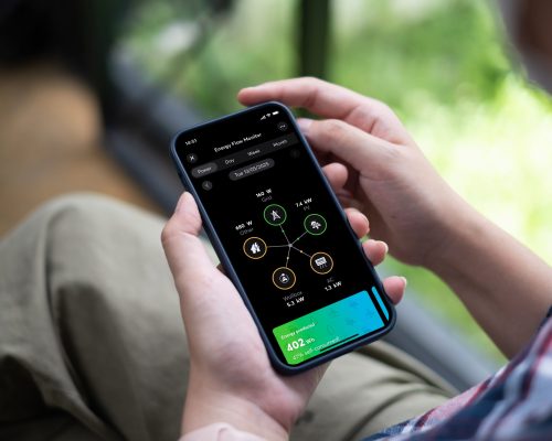 (c) Loxone iPhone-in-Hand-Room-Control-Energy-Flow (1)